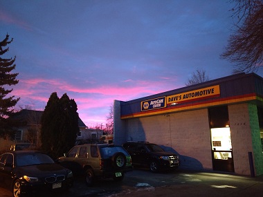 Dave's Automotive Specialists Inc in the early morning with pink and blue sky